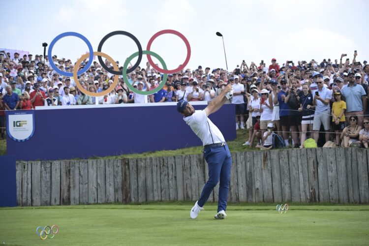 SAINT-QUENTIN-EN-YVELINES, FRANCE - AUGUST 02: Scottie Scheffler of Team USA tees off on the first hole during the second round of the 2024 Paris Olympics at Le Golf National on August 2, 2024 in Saint-Quentin-en-Yvelines, Ile-de-France. (Photo by Chris Condon/PGA TOUR/IGF)